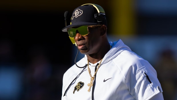 Colorado Buffaloes head coach Deion Sanders against the Arizona State Sun Devils at Mountain America Stadium